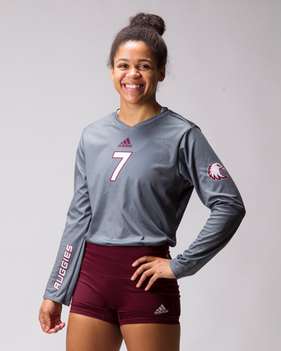 Sydnie Zachary shows off the new volleyball jerseys